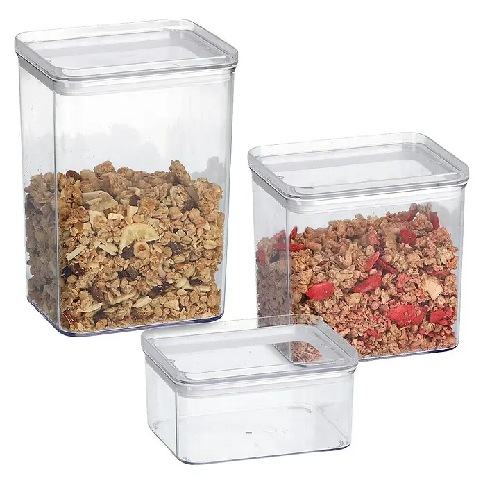 Vorratsdosen-Set - L x B x H: 18,5 x 12,8 x 10,4 cm, Kunststoff, Transparent - Drei klare Vorratsbehälter in verschiedenen Größen, gefüllt mit Müsli, zeigen ihre praktische und ästhetische Lagerung.