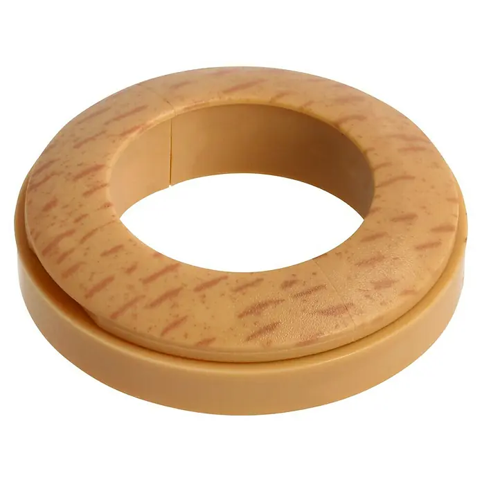 LOGOCLIC Rohrrosette - Buche, 2 Stk., Kunststoff - Nahaufnahme eines beigen WC-Sitzverkleinerers mit braunen Sprenkeln. Ideal für die Toilettenausbildung von Kleinkindern.