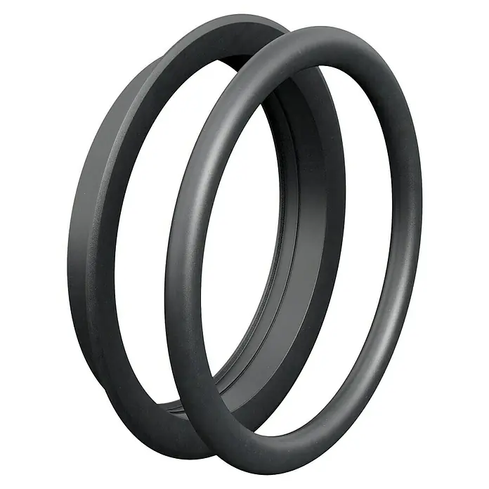KG Doppeldichtung - Nennweite: 100 mm - Nahaufnahme von zwei eleganten, anthrazitfarbenen Dichtungsringen, die sich in Form und Design unterscheiden.