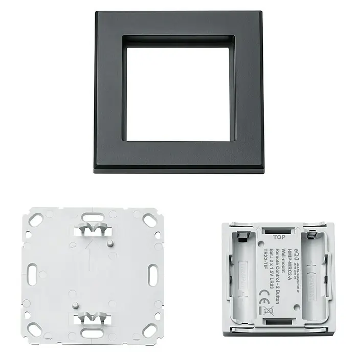 Homematic IP Funk-Wandtaster HmIP-WRC2-A - 2-fach, Batteriebetrieben, Anthrazit, 19 x 86 x 86 mm - Nahaufnahme eines eQ-3 Wandtasters HMIP-WRC2-A, der eine schwarze Blende und eine weiße Rückseite mit Batteriefach zeigt.