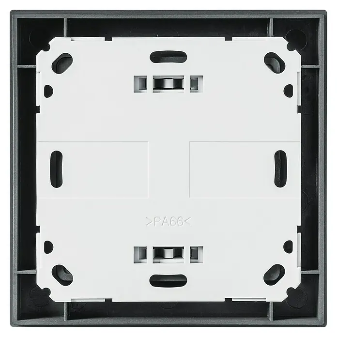 Homematic IP Bewegungsmelder HmIP-SMI55-A - Anthrazit, Batteriebetrieben, 150 m - Nahaufnahme der Rückseite einer grauen Lichtschalterabdeckung, die eine quadratische, weiße PA66-Kunststoffbasis mit Befestigungslöchern zeigt.