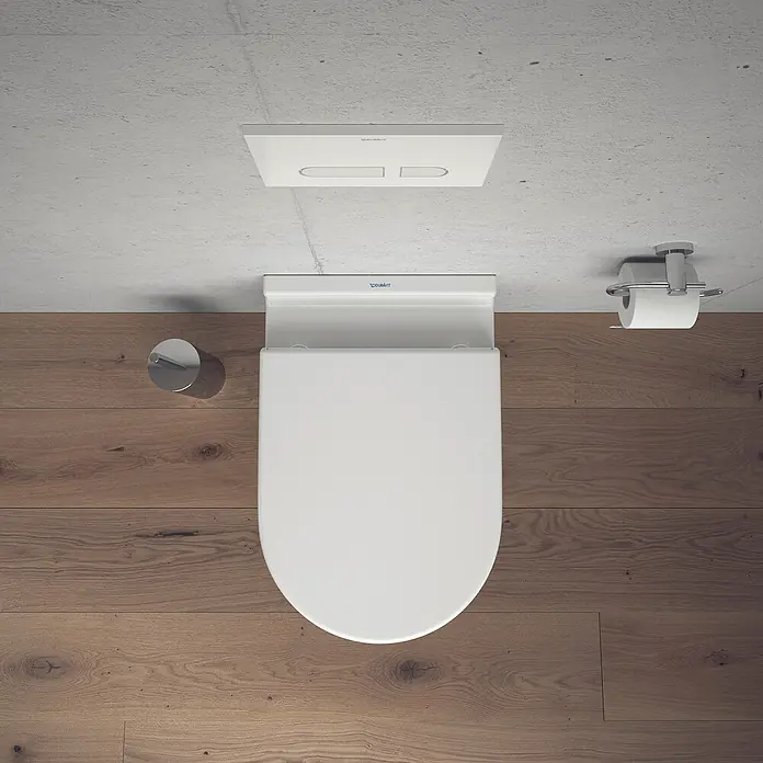 Duravit Starck 3 Wand-WC Typ 3 - Mit Spülrand, Ohne Spezialglasur, Spülform: Tief, WC Abgang: Waagerecht, Weiß - Draufsicht einer modernen, wandhängenden Duravit Toilette in einem Badezimmer mit Holzboden und Betonwand.