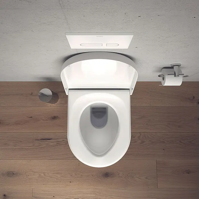 Duravit Starck 3 Wand-WC - Spülrandlos, Ohne Spezialglasur, Spülform: Tief, WC Abgang: Waagerecht, Weiß - Aufnahme von oben einer weißen Toilette mit hochgeklapptem Deckel und einer Toilettenpapierhalterung an der Wand.