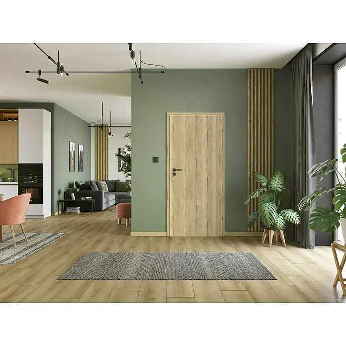 Classen PL Zimmertür - 860 x 1.985 mm, DIN Anschlag: Rechts, Eiche Claveland, Wabe - Ein stilvolles Interieur mit einer hellen Holztür, die sich harmonisch in das moderne Wohnambiente einfügt. Die Tür ergänzt die natürliche Farbpalette des Raumes.