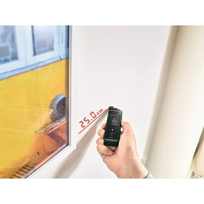 Bosch Messrad-Adapter Zamo - Passend für: Laser-Entfernungsmesser ZAMO IV - Nahaufnahme eines Bosch Zamo Lasermessgeräts, das eine Messung von 25.0 cm an einer weißen Wand anzeigt.