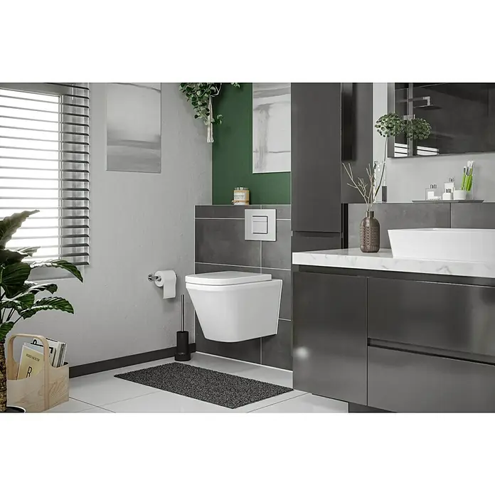 Camargue Los Angeles Wand-WC - Spülrandlos, Ohne Spezialglasur, Spülform: Tief, WC Abgang: Waagerecht, Weiß - Nahaufnahme einer modernen Toilette, die an einer grauen Wand montiert ist, neben einem dunklen Schrank und mit Bad-Accessoires für ein elegantes Aussehen.