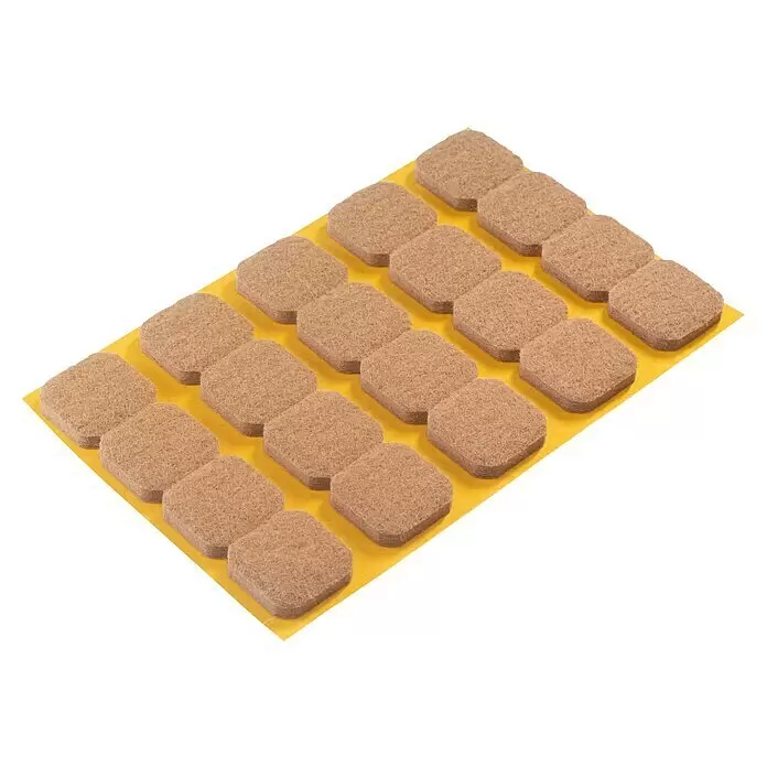 Stabilit Möbelgleiter - L x B x H: 22 x 22 x 5 mm, Rechteckig - Beige-braune quadratische Filzgleiter mit abgerundeten Ecken auf gelber Trägerfolie.