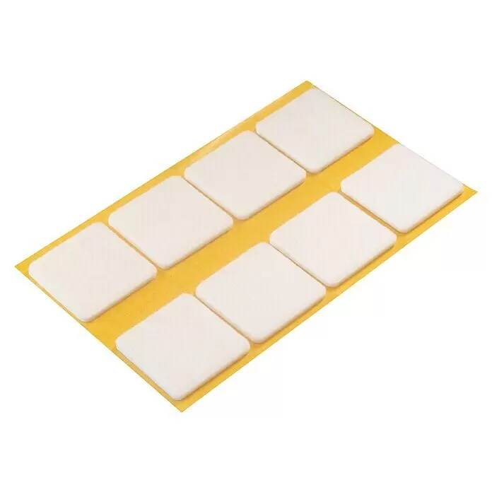 Stabilit Möbelgleiter - L x B x H: 34 x 34 x 3 mm, Rechteckig, 8 Stk. - Weiße quadratische Filzgleiter auf gelber Klebefolie zum Schutz von Möbeln und Böden.