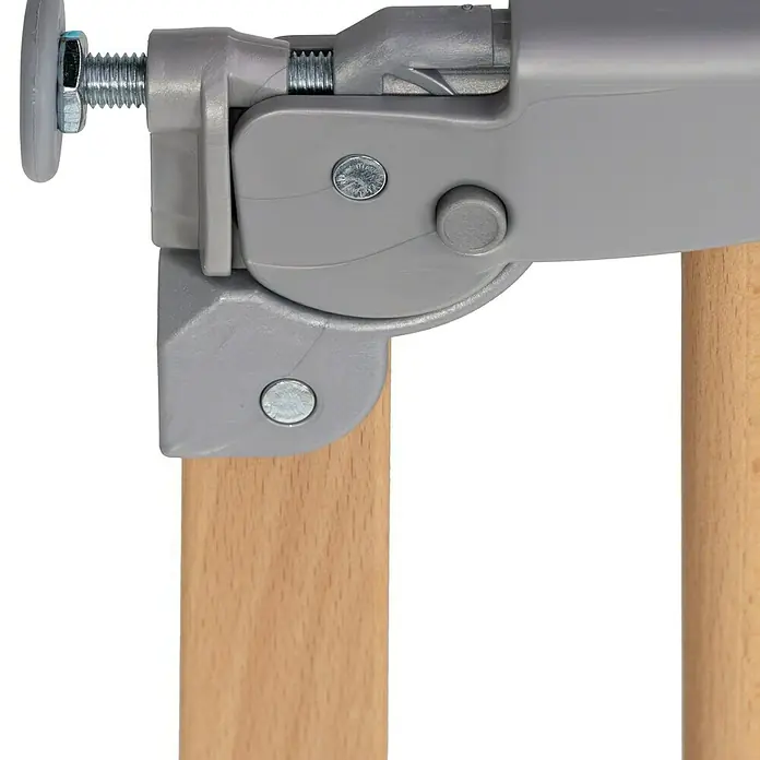 Star Stairs Sicherheitsgitter Pia - Höhe: 71 cm, 75,6 cm - 110,4 cm - Detailaufnahme eines Kindersicherheitstors mit Metallelementen und Holzbefestigung. Ein unverzichtbares Element für die Sicherheit Ihres Kindes.