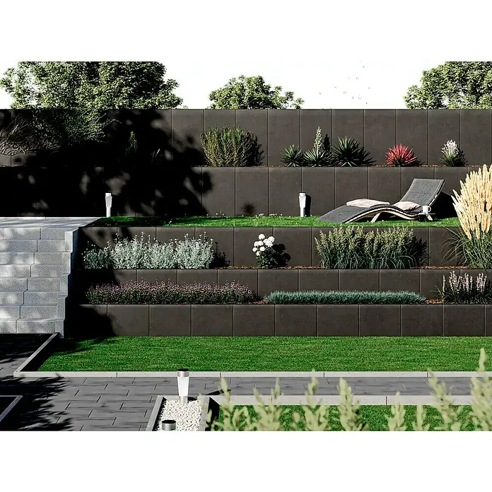 Diephaus L-Stein - 80 cm, 50 cm, Stärke: 7 cm, Anthrazit - Bild einer stilvollen Gartenmauer mit Pflanzen. Die Mauer ist modern und fügt sich gut in die grüne Umgebung ein.