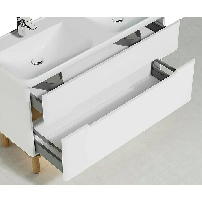 VitrA Sento Badmöbel-Set - Gesamtbreite Badmöbel: 130 cm, Weiß, Matt - Detailaufnahme eines weißen Waschbeckenschranks mit zwei offenen Schubladen, der ein modernes und funktionales Design zeigt.