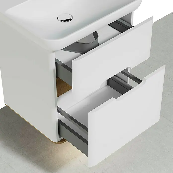 VitrA Sento Badmöbel-Set - 63 cm, Weiß, 2 Schubladen - Nahaufnahme eines weißen Badezimmerschranks mit zwei offenen Schubladen, der modernen Stauraum und minimalistisches Design zeigt.