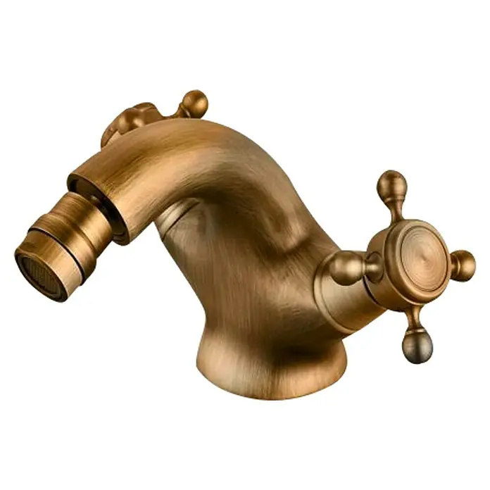 Universal de Grifería Classica Grifo bimando de bidé - Bronce, Mate - Primer plano de un elegante grifo dorado con detalles intrincados, que aporta un toque de lujo a cualquier decoración de baño.