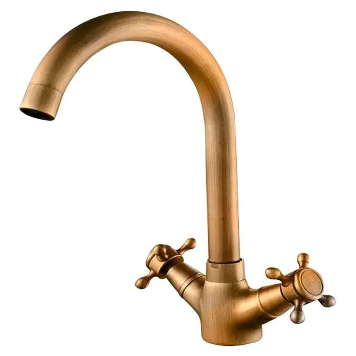 Universal de Grifería Classica Grifo de lavabo caño alto bimando - Bronce - Primer plano de un grifo de agua de bronce vintage con manijas cruzadas sobre un fondo negro.