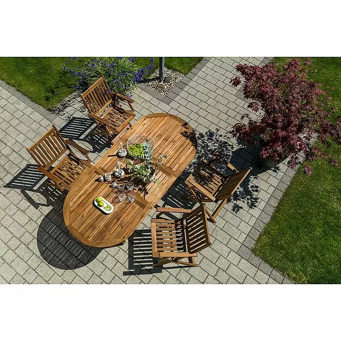 Sunfun Diana Gartentisch - L x B x H: 150 x 90 x 75 cm, Akazie, Braun, Ausziehbar - Ovale Holz-Gartenessgruppe mit fünf Stühlen, auf einer gepflasterten Fläche für Mahlzeiten im Freien.