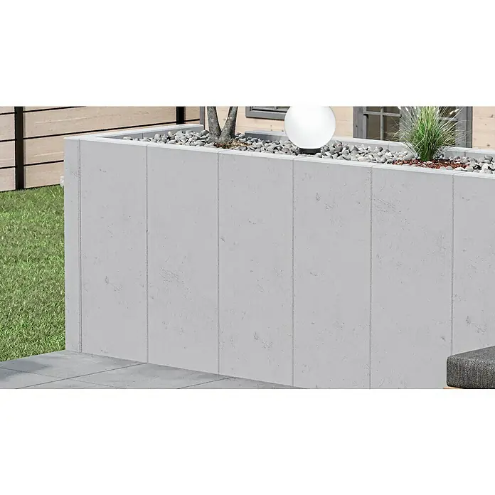 Diephaus L-Stein - 130 cm, 50 cm, Stärke: 12 cm, Grau - Ein detailliertes Bild eines grauen, modularen Hochbeets im Freien, ideal für Gartenprojekte. Die Oberfläche ist rau und stilvoll.