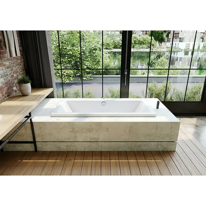 Kaldewei Badewanne Conoduo - 200 x 100 cm, Stahl-Email, Weiß - Ein schickes Badezimmer mit einer modernen weißen Badewanne vor einem großen Fenster mit Blick auf die Natur.