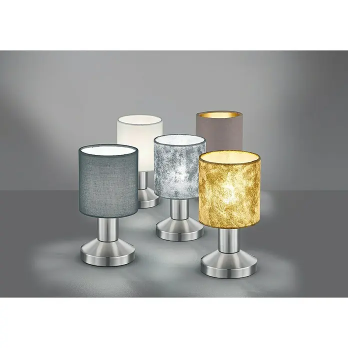 Trio Lighting Lámpara de sobremesa Garda - 25 W, L x An x Al: 9,5 x 9,5 x 18 cm, Blanco, E14 - Cinco lámparas de mesa con pantallas de tela en diferentes colores sobre un fondo gris.