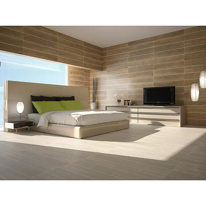 Gecol Mortero seco Multiusos - 25 kg, Gris - Un dormitorio elegante con azulejos horizontales en la pared y azulejos en el suelo a juego, con una cama decorada con almohadas verdes.