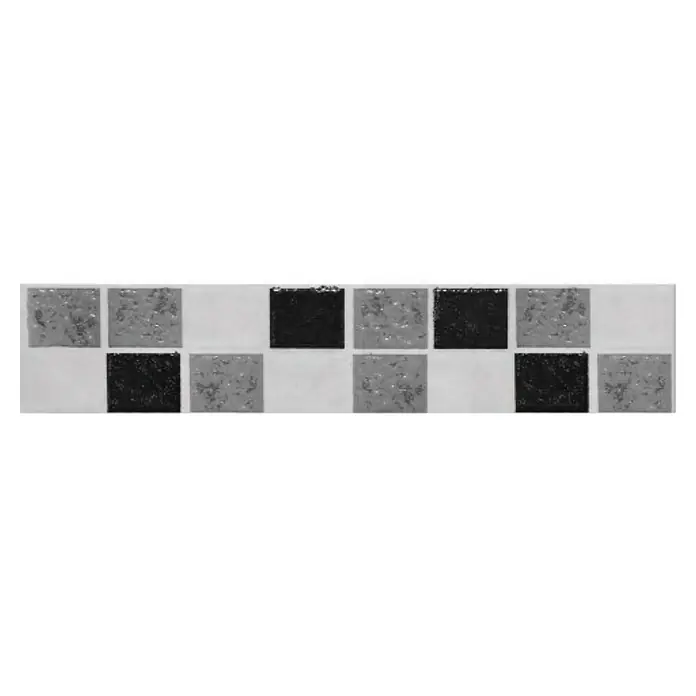 Fliesenbordüre Loft - 6 x 25 cm, Grau/Schwarz/Weiß, Matt - Das Bild zeigt Keramikfliesen in einer Schachbrettanordnung, die ein interessantes Muster erzeugen, perfekt für ein Badezimmer.