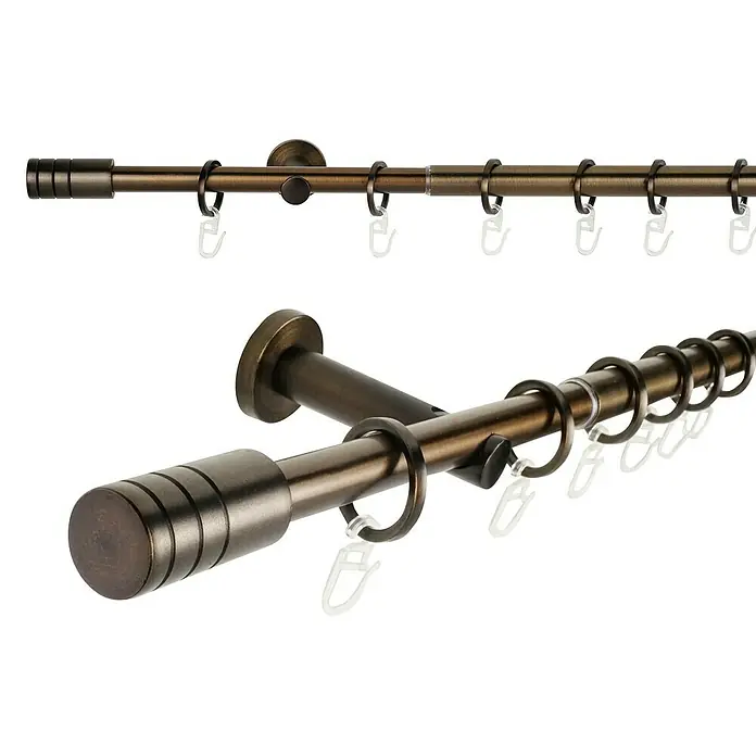 Expo Ambiente Stilgarnitur Rillcube - Länge Gardinenstange: 160 cm - 280 cm, Bronze - Nahaufnahme einer bronzefarbenen Gardinenstange mit Ringen und Endstücken, die eine elegante Fensterdekoration darstellt.