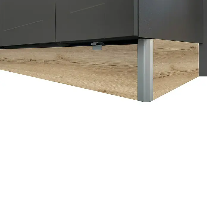 Optifit Sockelrückführung Optikomfort Erik290 - 1,6 x 48,8 x 17,5 cm - Nahaufnahme einer Kommode in Grau und Holzoptik mit Fokus auf die Schublade, die einen modernen Look verspricht.