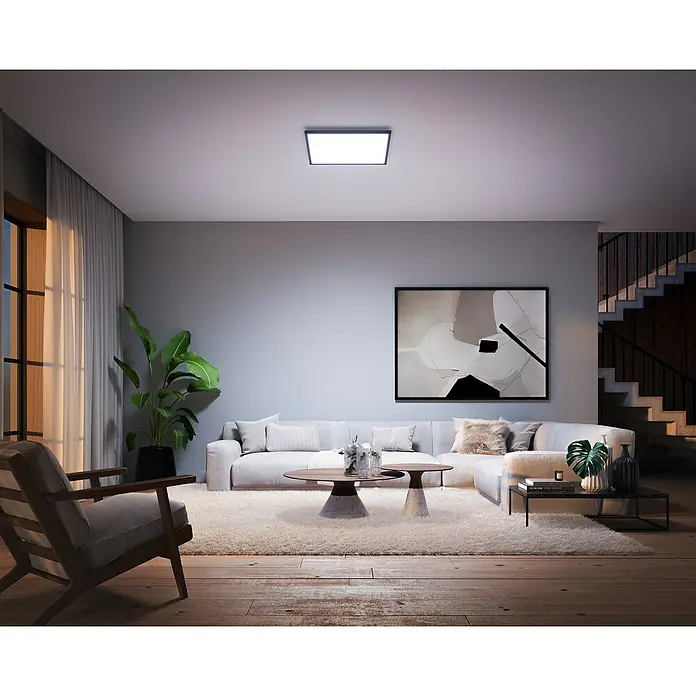 Philips Hue LED-Panel Aurelle - 39 W, L x B x H: 60 x 60 x 4,6 cm, Schwarz, Warmweiß - Das LED-Panel an der Decke sorgt für helles und effizientes Licht in diesem stilvollen Wohnzimmer. Perfekt für moderne Wohnräume.