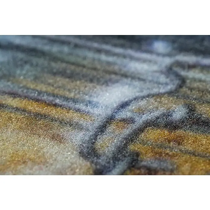 Teppichläufer TrendyPasta, 145 x 45 cm, 100 % Polyamid (Flor) - Nahaufnahme eines Teppichs mit verschwommenem Muster in Grau-, Braun- und Goldtönen, die eine weiche Textur und ein abstraktes Design zeigen.