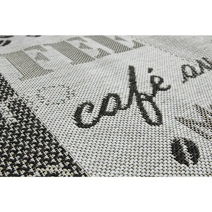 Teppichläufer Arizona - Grau, 150 x 50 cm, 100 % Polypropylen - Nahaufnahme eines gewebten Teppichs mit dem Wort "Café" in kursiver Schrift, ideal für stilvolle Akzente in Wohnräumen.