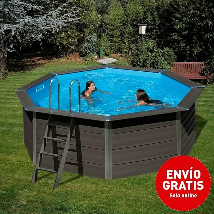 Gre Piscina de WPC Avantgarde - Ø x Al: 410 x 124 cm, Gris oscuro, 11.000 l - Una piscina hexagonal en el jardín con dos mujeres nadando y una escalera para entrar y salir.