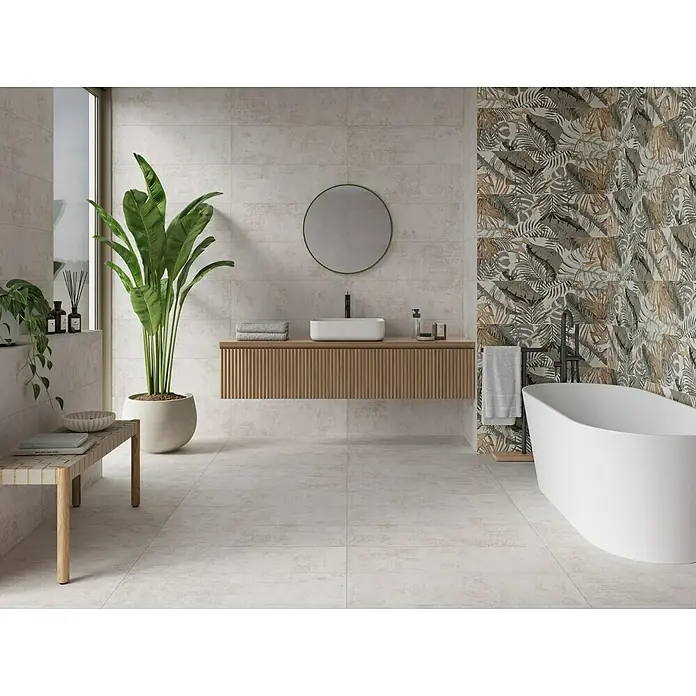 Wandfliese Studio - 30 x 90 cm, Bone, Matt - Ein modernes Badezimmer mit hellen Fliesen, einer freistehenden Badewanne und grünen Pflanzen, die eine ruhige Atmosphäre schaffen.
