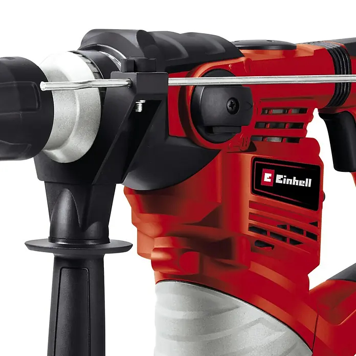 Einhell Kombihammer TC-RH 1600 - 1.600 W, 4 J, SDS-Plus-Aufnahme - Nahaufnahme eines roten Einhell Bohrhammers, der für schwere Bohrarbeiten und Abbrucharbeiten konzipiert ist.