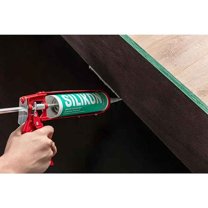 Sanitär-Silikon - Grau, 300 ml - Verwendung einer Silikonpistole, um eine Lücke zwischen zwei Oberflächen mit Dichtmittel zu füllen, um eine dichte Abdichtung zu gewährleisten.
