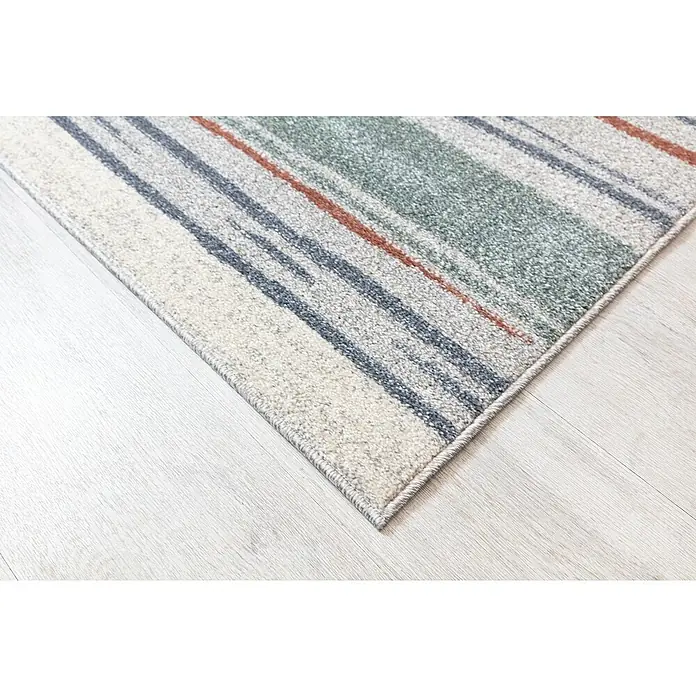 Alfombra de pelo corto Savannah Rayas - Gris, 180 x 120 cm - Primer plano de una alfombra moderna con un patrón de rayas de varios colores.