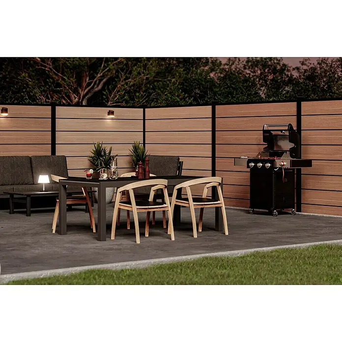 Grillstar Gasgrill Powerburner 350-1 - Grillfläche (B x T): 57 x 41 cm, 8,79 kW, Anzahl Brenner: 3 - Ein stilvoller Außenbereich mit Grill, Esstisch und bequemer Sitzecke. Die passende Beleuchtung sorgt für Atmosphäre.