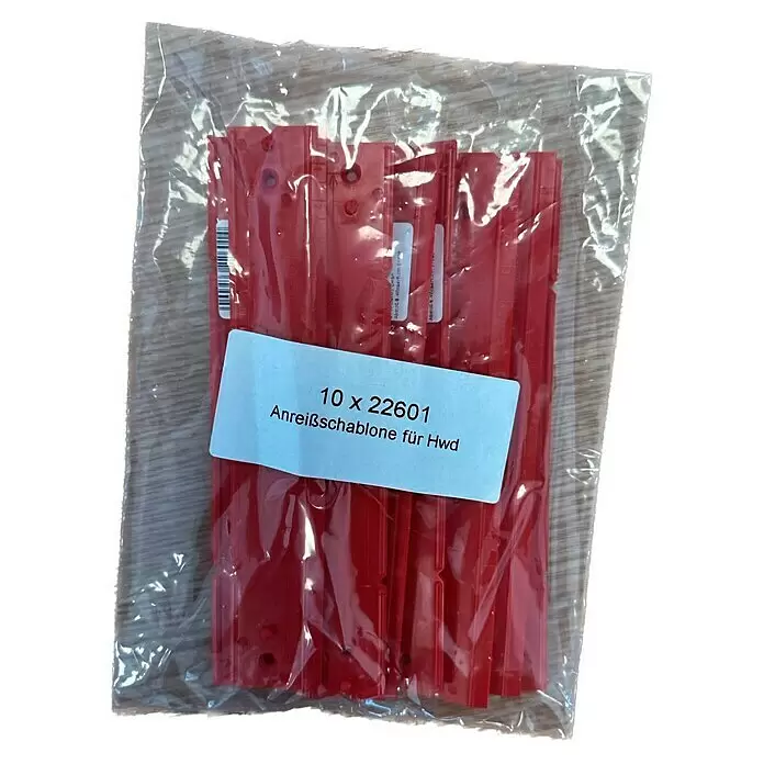 Bohrschablone - Geeignet für: Hohlwanddosen - Zehn rote Kunststoff-Anreißschablonen für Hwd, verpackt in einem transparenten Beutel.
