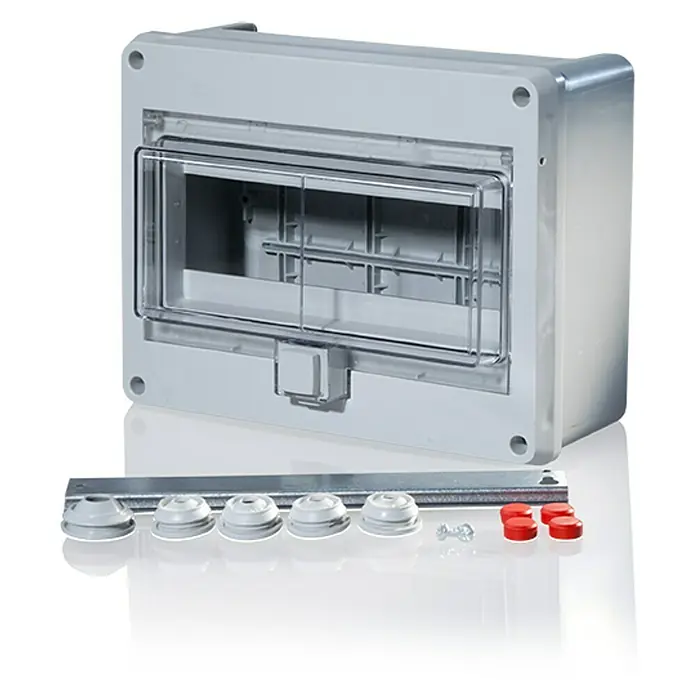 F-tronic Aufputz-Verteiler Feuchtraum - Anzahl Reihen: 1 Stk., 23 x 9 cm, Grau - Ein grauer Sicherungskasten mit durchsichtigem Deckel und Zubehör für die Installation, ideal für Elektroinstallationen.