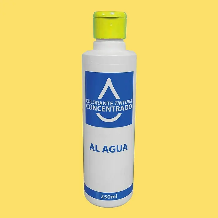 Colorante Concentrado al agua - Amarillo, 250 ml - Una botella de tinte concentrado "Al Agua" con un tapón amarillo sobre un fondo amarillo.