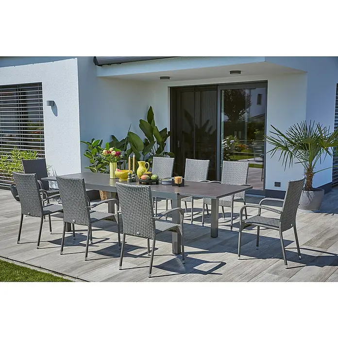Sunfun Gartenmöbel-Set Maja Stone/Neila - 9 -tlg., Sintered Stone/Aluminium/Stahl/Polyrattan, Tischplatte ausziehbar, Anthrazit/Grau - Graue Gartenmöbelgarnitur mit Esstisch und Stühlen auf einer Terrasse, ideal für Mahlzeiten im Freien und Entspannung.