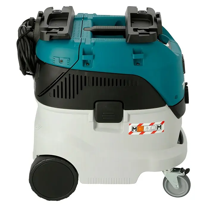 Makita Elektro-Nass- & Trockensauger VC4210M - 1.200 W, Behältervolumen: 42 l, Mit Beutel - Ein Makita Nass- und Trockensauger in Türkis, Schwarz und Weiß.