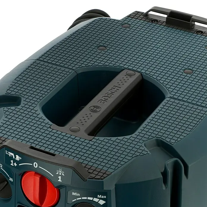 Bosch Professional Elektro-Nass- & Trockensauger GAS 35 M AFC - 1.200 W, Behältervolumen: 35 l, Mit Beutel - Nahaufnahme eines Bosch-Produkts mit Fokus auf Details wie Textur und Bedienelemente für verschiedene Einstellungen.