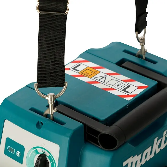 Makita LXT 18V Akku-Nass-Trockensauger DVC750LZX3 - 18 V, Ohne Akku, Behältervolumen: 7,5 l - Nahaufnahme eines türkisfarbenen Makita-Produkts mit schwarzem Tragegurt und Warnhinweisen.
