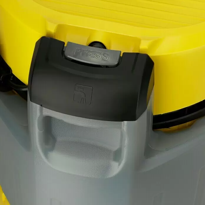 Kärcher Lava-aspirador SE 4002 - 1.400 kW, Volumen de recipiente: 4 l - Detalle de un dispositivo de limpieza amarillo y gris, mostrando un asa negra con un botón "PRESS" y un símbolo de transporte.