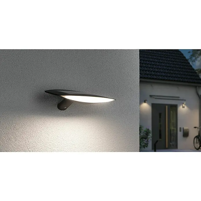 Paulmann Solar-Außenwandleuchte Kiran - 3 W, L x B x H: 16,8 x 30 x 6,5 cm, Anthrazit, IP44, 180 lm - Moderne Außenleuchte mit flachem, futuristischem Design an einer strukturierten Wand, die elegantes Licht spendet.