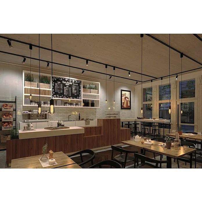Paulmann Inner Glow LED-Lampe Vintage Glühlampenform E27 - E27, Nicht Dimmbar, Warmweiß, 80 lm, Tropfen, Farbe: Smoky - Ein Café-Innenraum mit Holztischen, Pendelleuchten und einer Speisekarte an der Wand, der ein gemütliches Ambiente für Kaffeeliebhaber schafft.