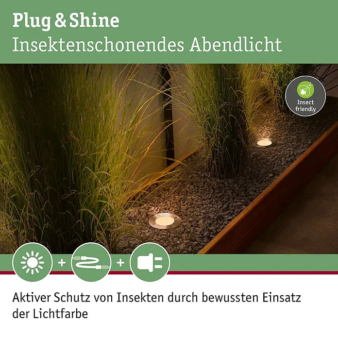 Paulmann Plug & Shine Bodeneinbauleuchte Floor insektenfreundlich - 9,8 cm, Bernstein, IP67, Silber - Das Bild zeigt Plug & Shine Insekten schonendes Abendlicht für den Garten. Die Lampen sind in einem Beet mit Kies und Pflanzen installiert.