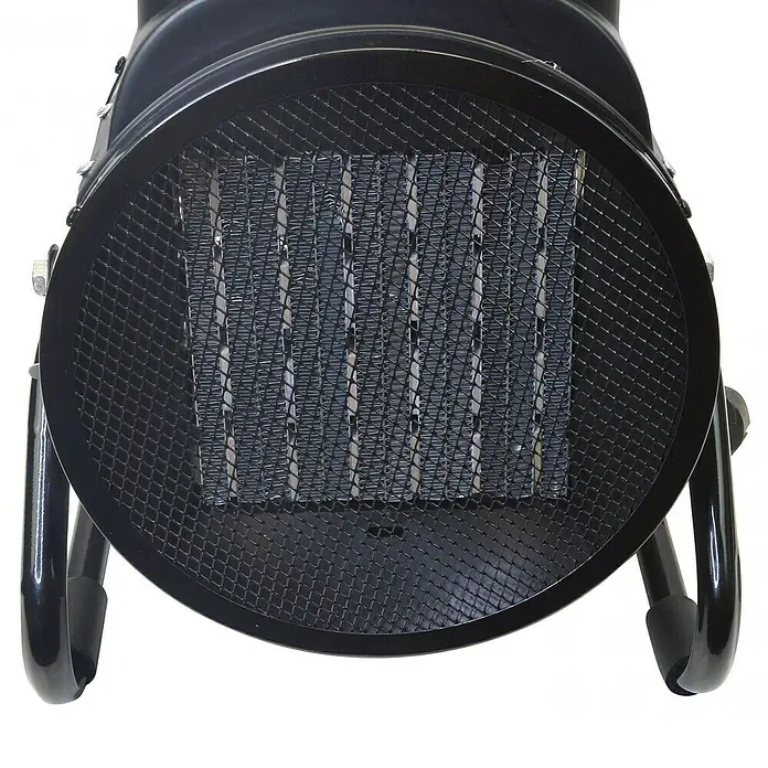 Purline Calefactor industrial HOTI F3000 - 1.500 kW - 3.000 kW - Primer plano de un calefactor negro con una rejilla protectora redonda delante de los elementos calefactores.