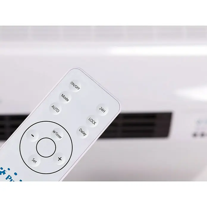 Purline Calefactor de aire Split HOTI M50 - 2.000 W, Blanco - Primer plano de un mando a distancia de aire acondicionado con botones para on/off, modo, auto, temporizador, 24h, bloqueo y retardo.