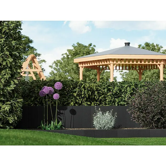 Diephaus Rechteckpalisade - 16,5 x 12 x 60 cm, Anthrazit, Beton - Schwarze Gartenmauer mit Pflanzen und Blumen. Die Mauer ist aus Betonsteinen gefertigt und bietet einen schönen Hintergrund für die Bepflanzung.