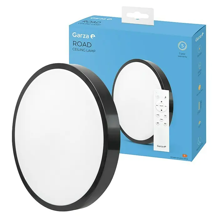 Garza Plafón LED redondo Road - 24 W, 29,5 cm, Negro, Blanco frío - Imagen del producto de una lámpara de techo Garza Road con mando a distancia y el embalaje del producto al fondo.